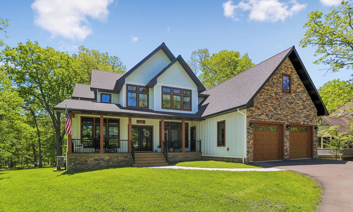 Waterfront Greens House | Experience luxury at 'Somewhere Only We Know' in Stillwater with stunning lake views!