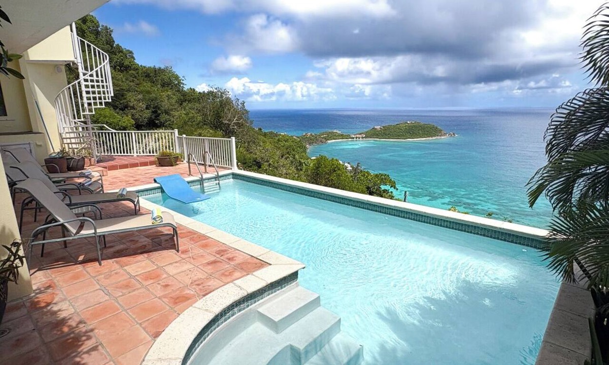 Monte Villa | Experience the ultimate retreat at One Love, featuring stunning views, a refreshing pool, and complete A/C comfort throughout your stay! Don’t miss out on this perfect getaway!
