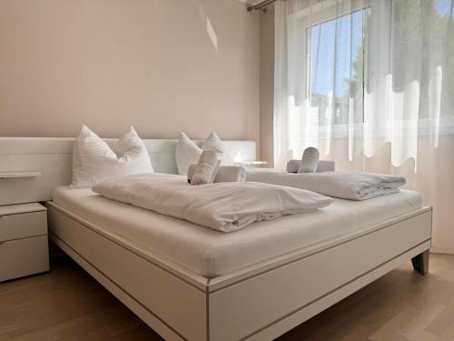 Latschach Apartment | FAAKER SEE HIDEAWAY - Apartment mit Garten