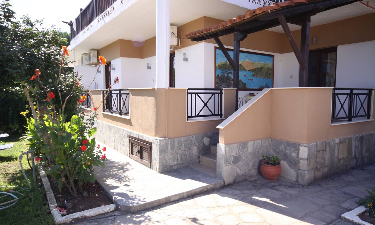 Vourvourou Apartment | Family house with nice garden ,very close to the sandy beach.