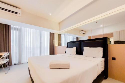 Pagedangan Apartment | Fancy and Nice Studio Apartment Carstensz Residence By Travelio