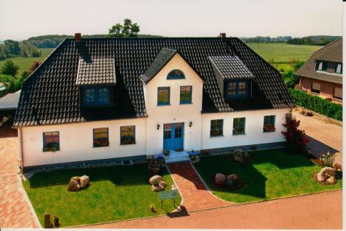 Clausdorf Apartment | Ferienwohnungen zur Eule - Steinkauz