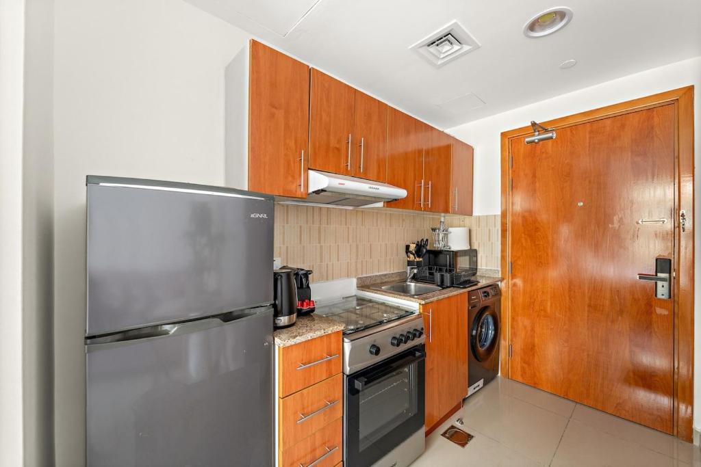 Dubai Production City Apartment | FIRST CLASS Studio Cozy & Chic Retreat