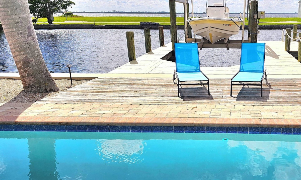 Matlacha Villa | Florida Style Villa by the Water with heated Pool, Dock, Gulf access! Kayaks!