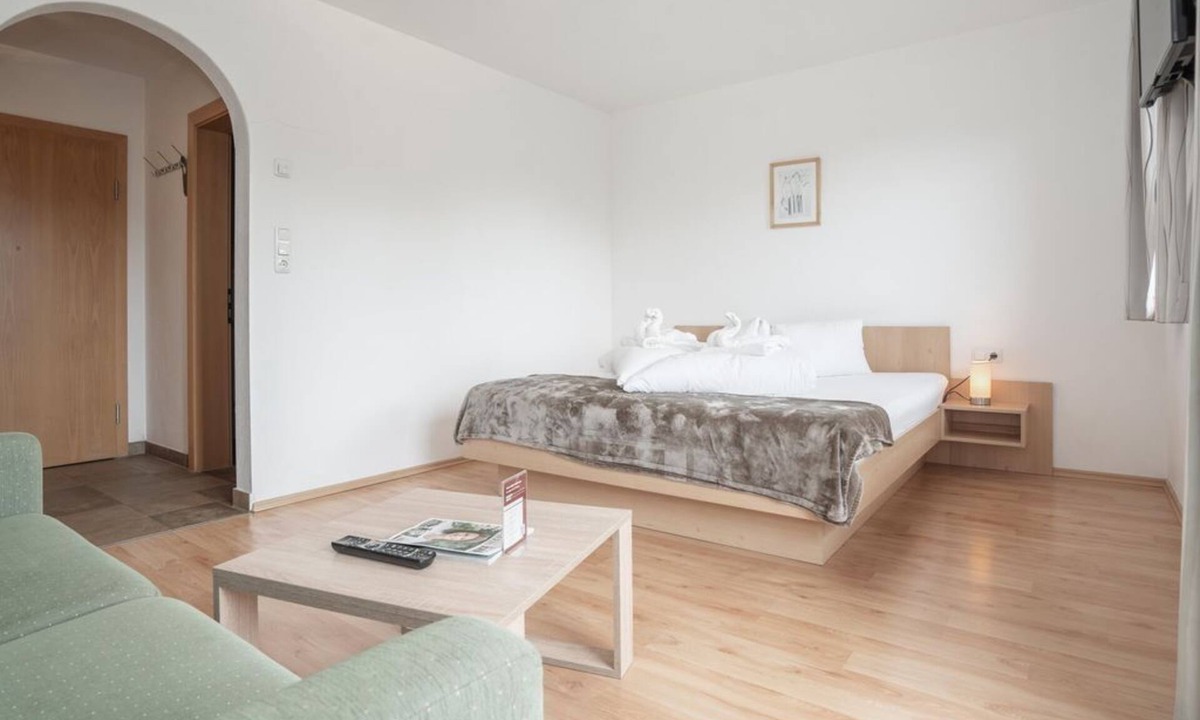 Scheffau am Wilden Kaiser Bed & Breakfast | Four-bed room 11 shower/WC, from 4 nights half board - Berggasthof Bärnstatt