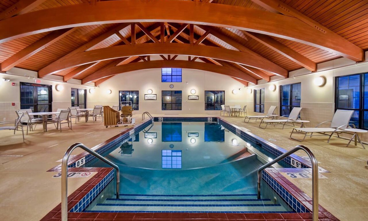 Madison Condo | Free Breakfast. Pool + Hot Tub. Near East Towne Mall!