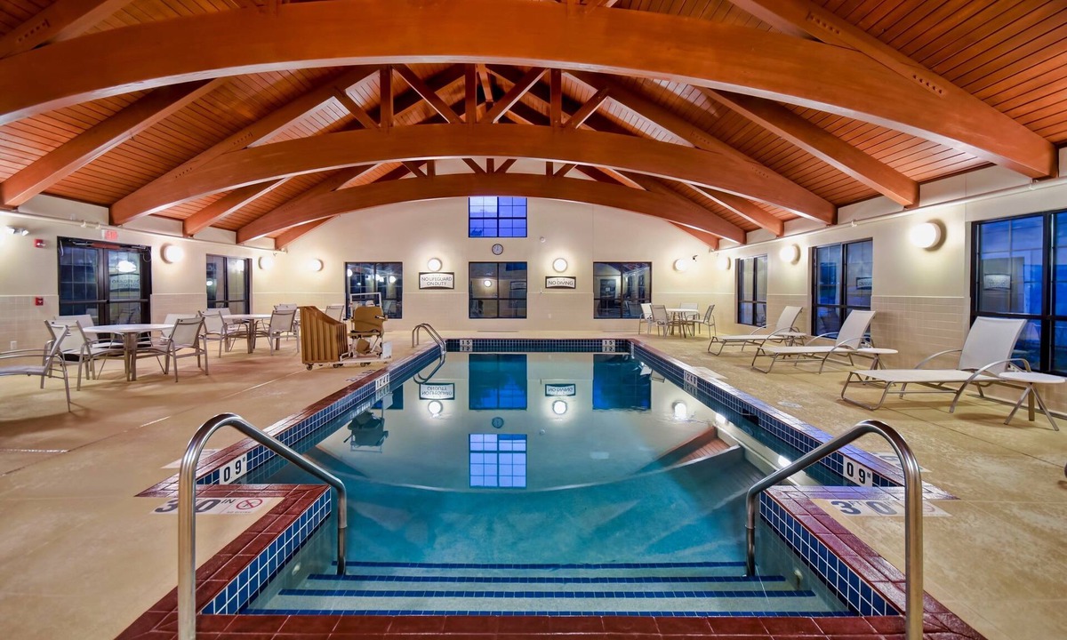 Madison Condo | Free Breakfast. Pool & Hot Tub. Near East Towne Mall!
