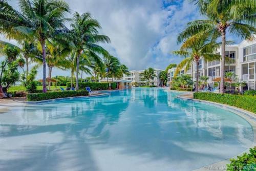 Rock Harbor House | FULL TIME LIC Mgr - MODERN 4 BED 4 BATH VILLA - UPSCALE OCEANFRONT RESORT - INDOOR PICKLEBALL - SPEAKEASY!