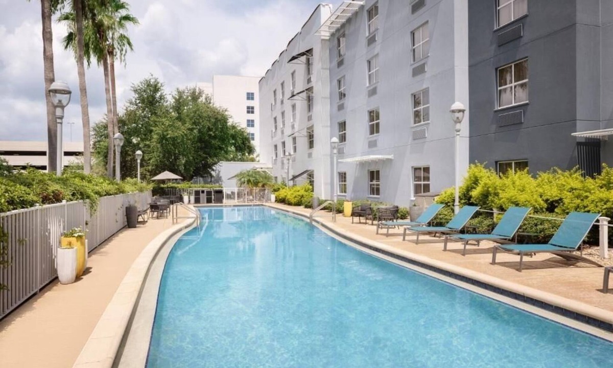 Westshore Hotel | Fully Equipped Kitchen in Modern Suite with Airport Shuttle and Swimming Pool