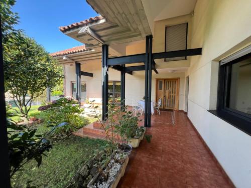 Llanes Villa | Gestiona2R- Casa grande para 12 en Llanes 6 dormitorios Jardín y espacio exterior