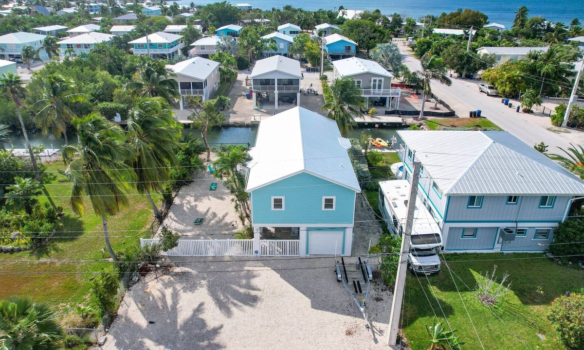 Cutthroat Harbor Estates House | Ginger's Paradise, 3 Bed, 2 Bath Canal Front Home in Cudjoe Key