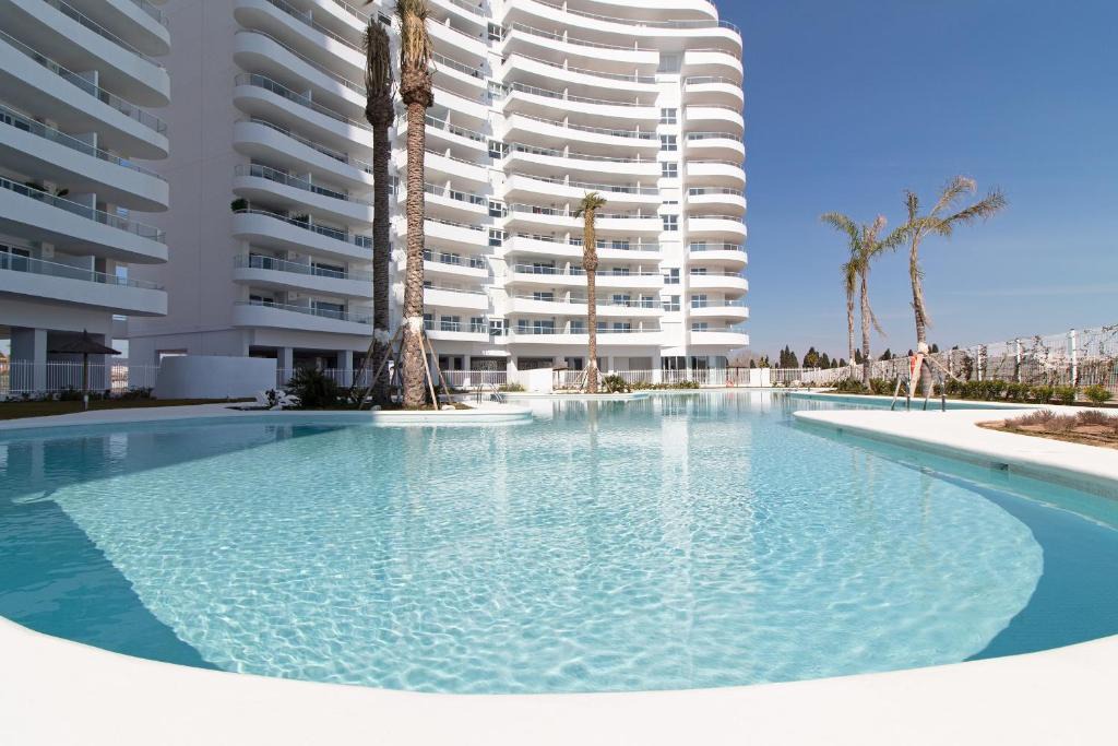 Canet de Berenguer Apartment | Global Vacacional, Apartamento con terraza, vistas al mar y a la piscina