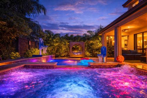 Tamiami Villa | Glow Lakefront Villa, Heated Pool - Spa, 4K Cinema