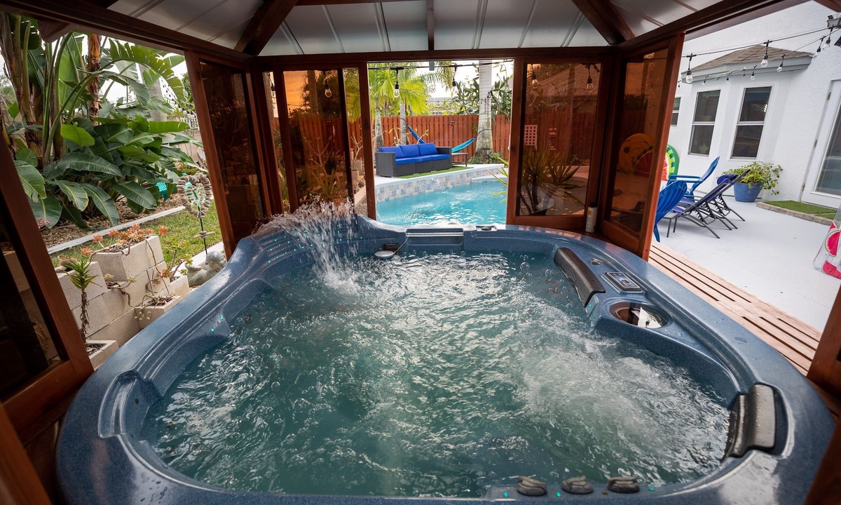Tropic House | Gorgeous Urban Oasis W/hot Tub, Heated Pool And Private Movie Theater 3 Bedroom Home by RedAwning