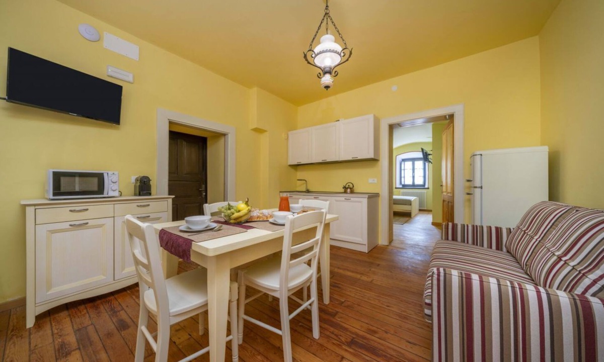 Tarvisio Apartment | GuestHost - A comfortable and welcoming 37 square meters apartment, perfect for four people, located on the ground floor of a historic building built in 1864 and renovated in 2025 while maintaining its historic atmosphere (NO elevator).The property is lo