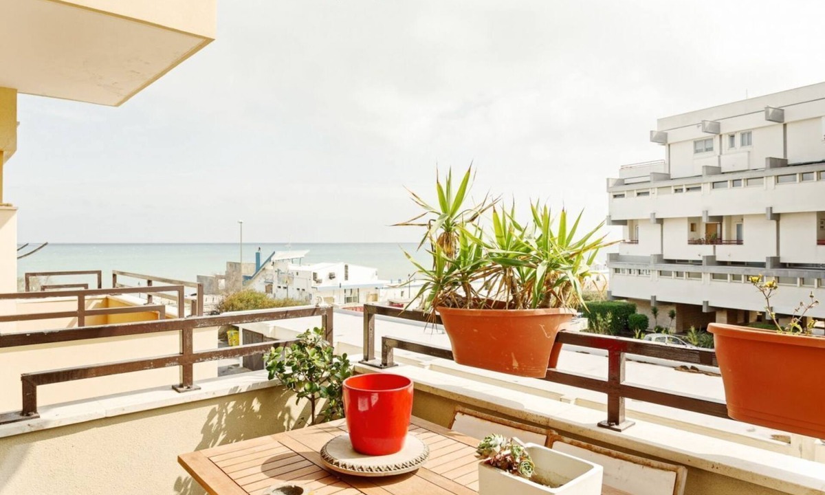 Palese Apartment | GuestHost - Beautiful and elegant apartment of 105 sqm that can accommodate up to 6 people. It is located on the seafront. At guests' disposal, there are two balconies with sea views and all the technological comforts such as a home theater system, split