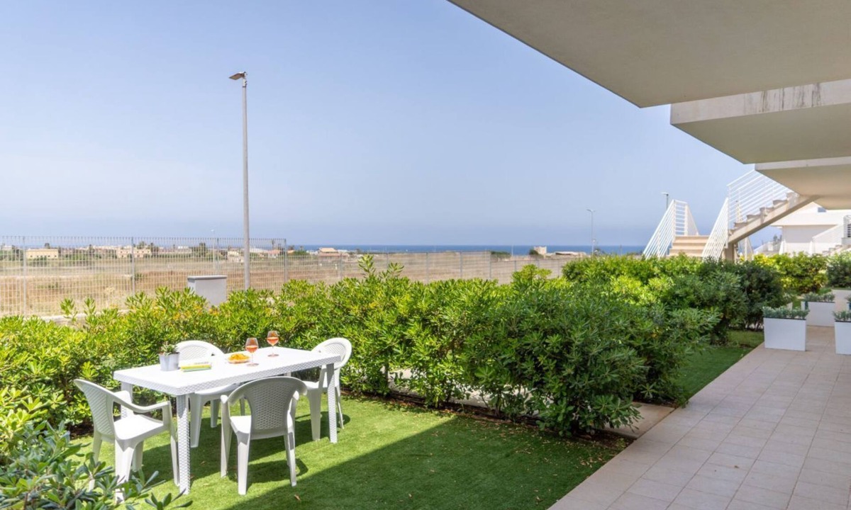 Pachino Apartment | GuestHost - Charming 75 sqm seaview apartment on two levels, for 5 people, located inside the renowned Borgo 84 residence, equipped with swimming pool and cycle path. The property is located just 3 km from the center of Marzamemi, one of the most fascina