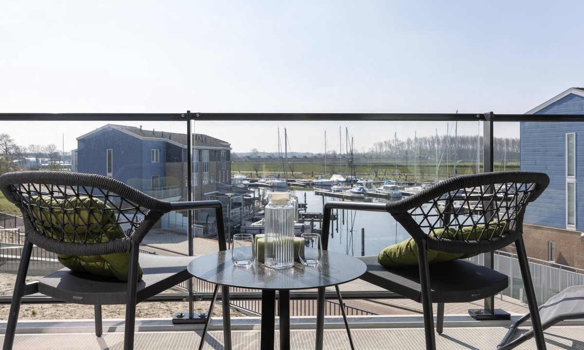 Kortgene Apartment | Harbour apartment with beautiful views