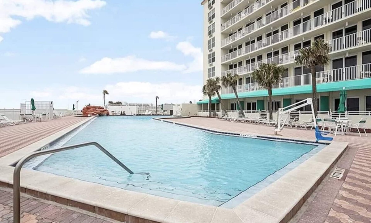 Lenox Park Condo | Heated pool. Right next to sunsplash park landshark grill and crabbys restaurant