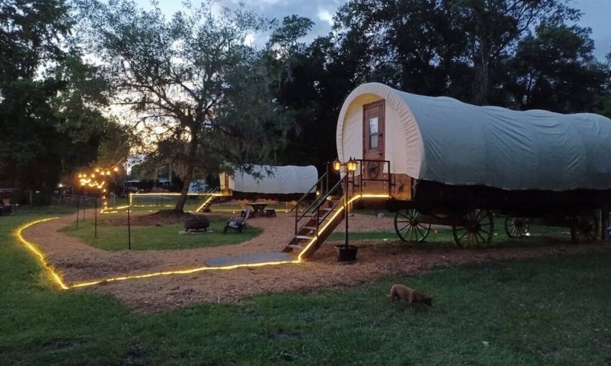 Putnam Hall Cabin | Highland Cow Glamping in a Cozy King Bed Wagon