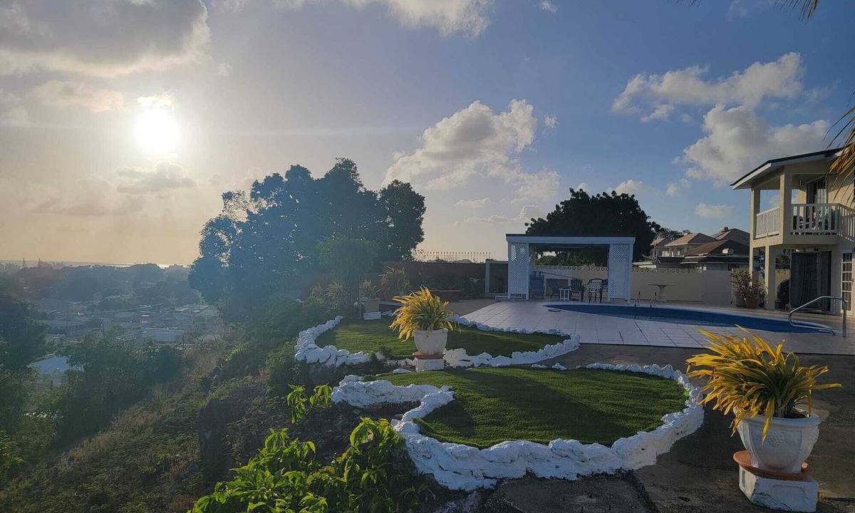 Rendezvous Apartment | Hillside view and a pool