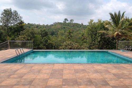 Vayittiri Hotel | Holiday Courtyard Wayanad