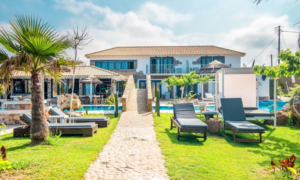 Arillas Apartment | Holiday Studio 'Mirage Arillas Maisonette A' next to Beach with Balcony, Shared Pool & Wi-Fi