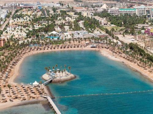Village Road Resort | Hostgool Beach Chalets Mirage bay resort & aqua park