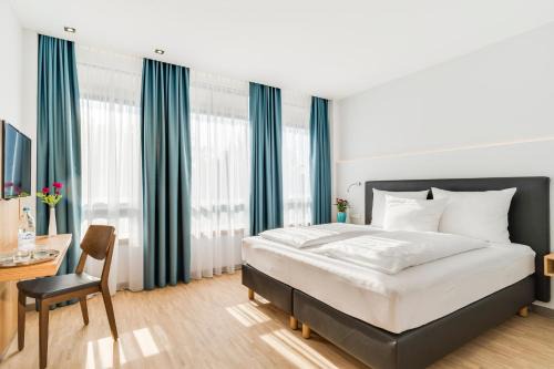 Altenerding Hotel | Hotel-Etage Apfelrot managed by Hotel Apfelbaum
