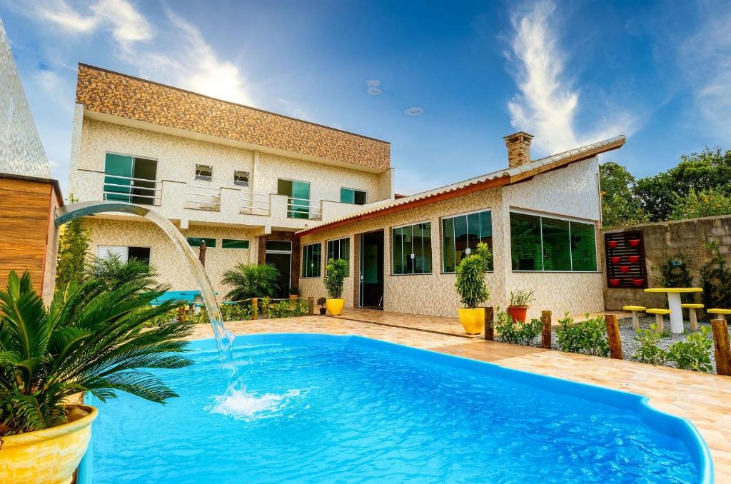 Cidade Nova Peruibe House | House with Swimming Pool and Barbecue area in Peruíbe with lots of comfort for 16 people