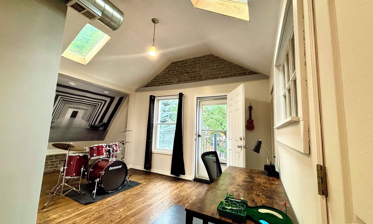 Chicago Apartment | Industrial Loft 2BR + DRUM KIT + Exposed Brick + 2 Private Decks & Lush Backyard