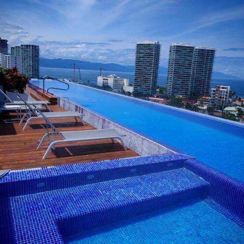 North Hotel Zone Apartment | Infinity Pool- Walk to Beach, Marina y La Isla