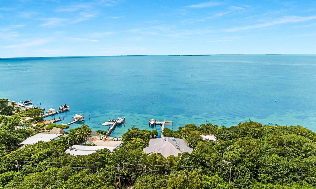 Tavernier House | Islamorada Bayfront home, sunsets, remodeled, infinity pool, beach, dockage.