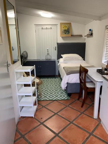 Stellenbosch Apartment | Just a Bed parking on street