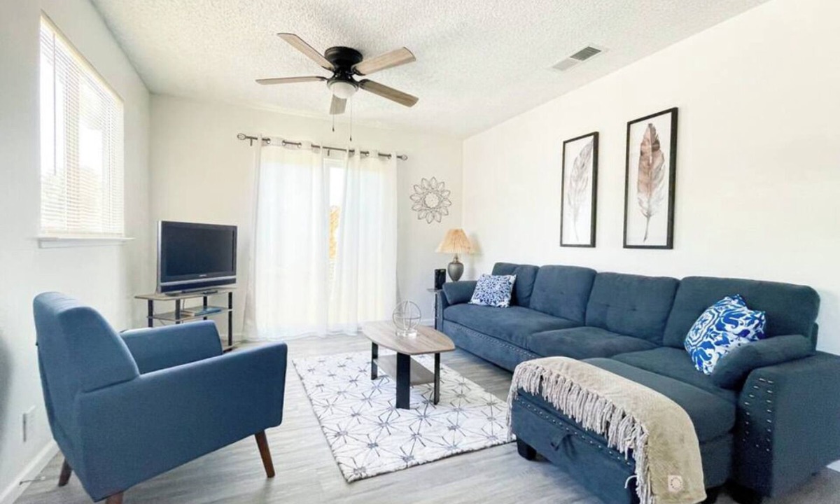 Coalinga House | Kick back in this calm, stylish 2-bedroom home in the heart of Coalinga. Perfect for families or professionals, it features a dedicated workspace, a fully equipped kitchen, and a bright living area.