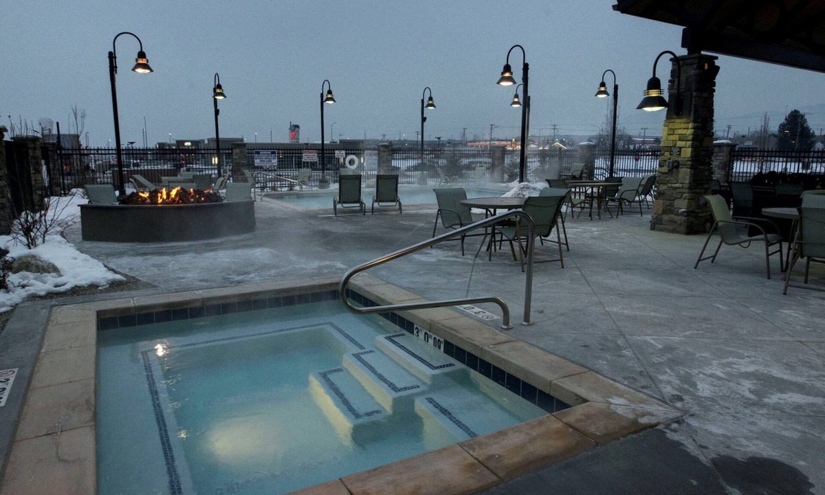 Midvale Apartment | King Suite | Heated Pool & Hot Tub. Free Breakfast Buffet. Near Jordan Landing!