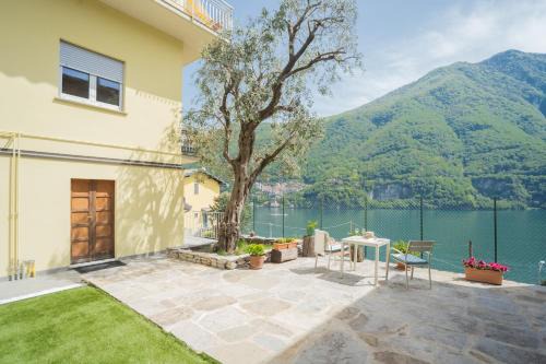 Laglio Apartment | La Quiete with Private Garden by Rent All Como