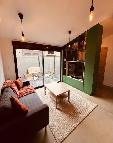Escoville House | La vague verte