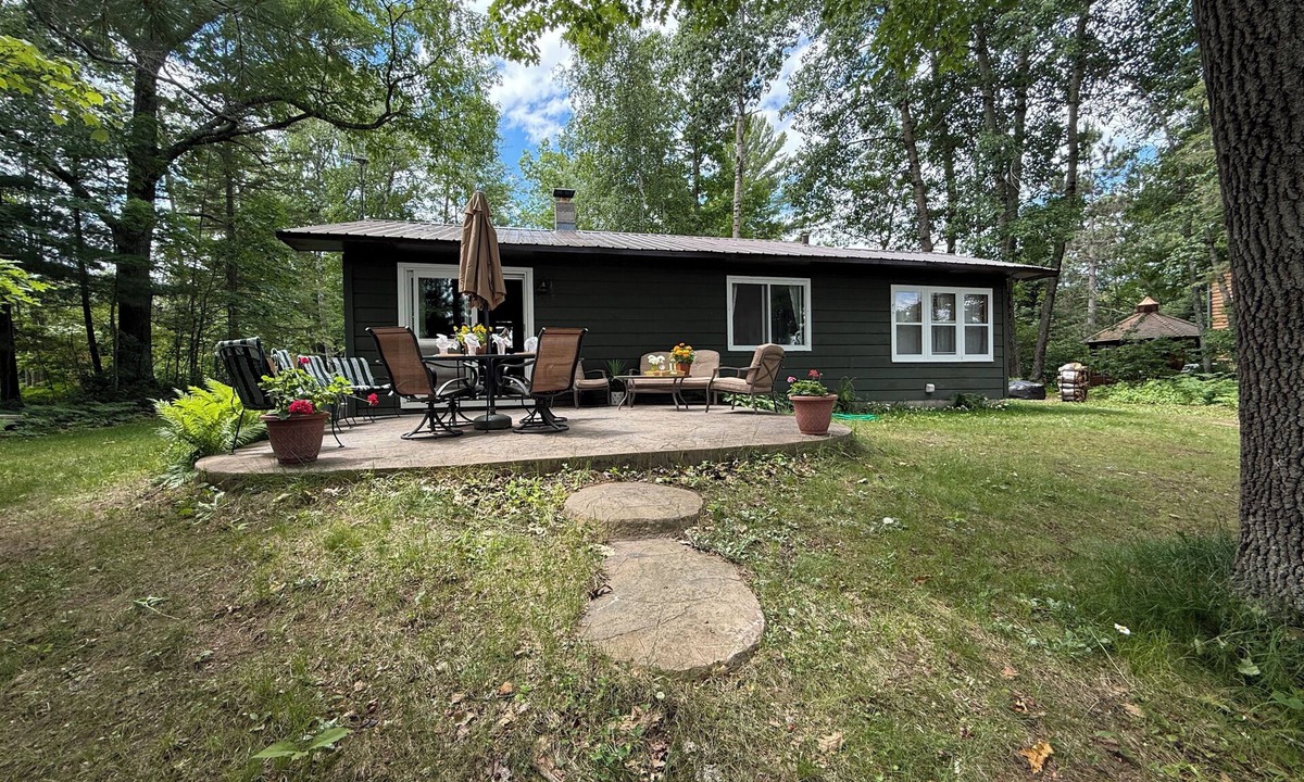 Hayward House | Lake Chippewa Flowage - Secluded patio, private home & dock, A/C, washer, dryer