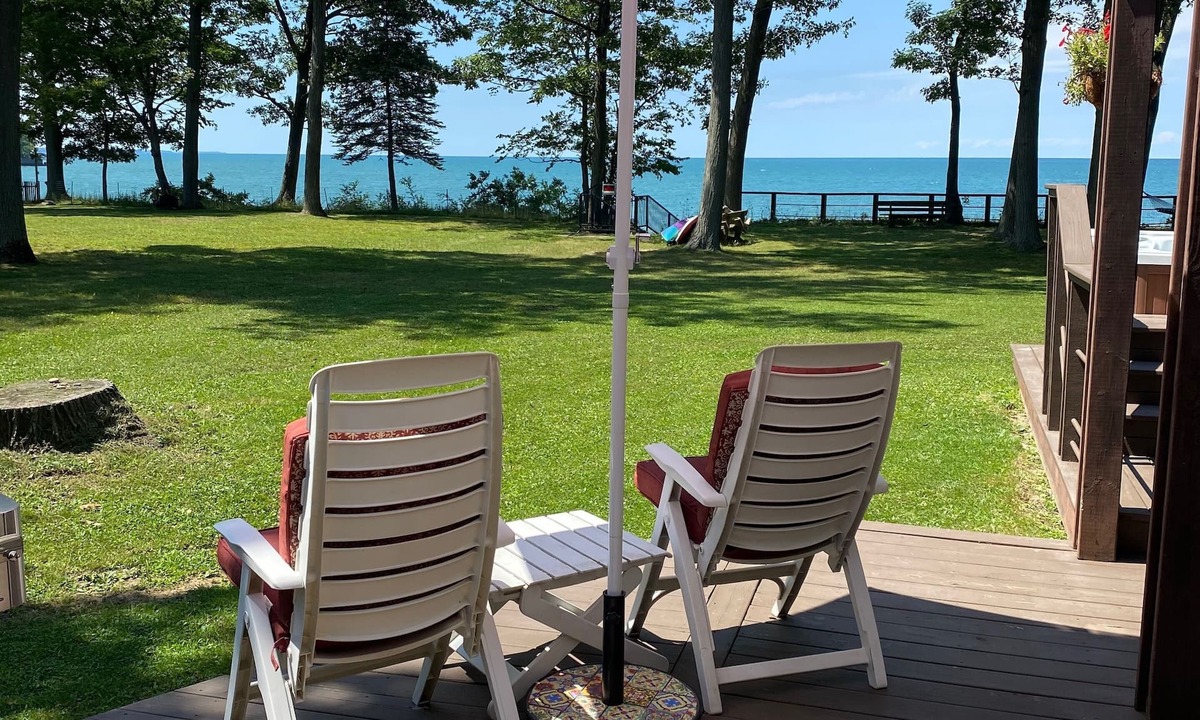Irving House | Lake Front Home. Private stairs to private beach and bay. upscale 5 bedroom home
