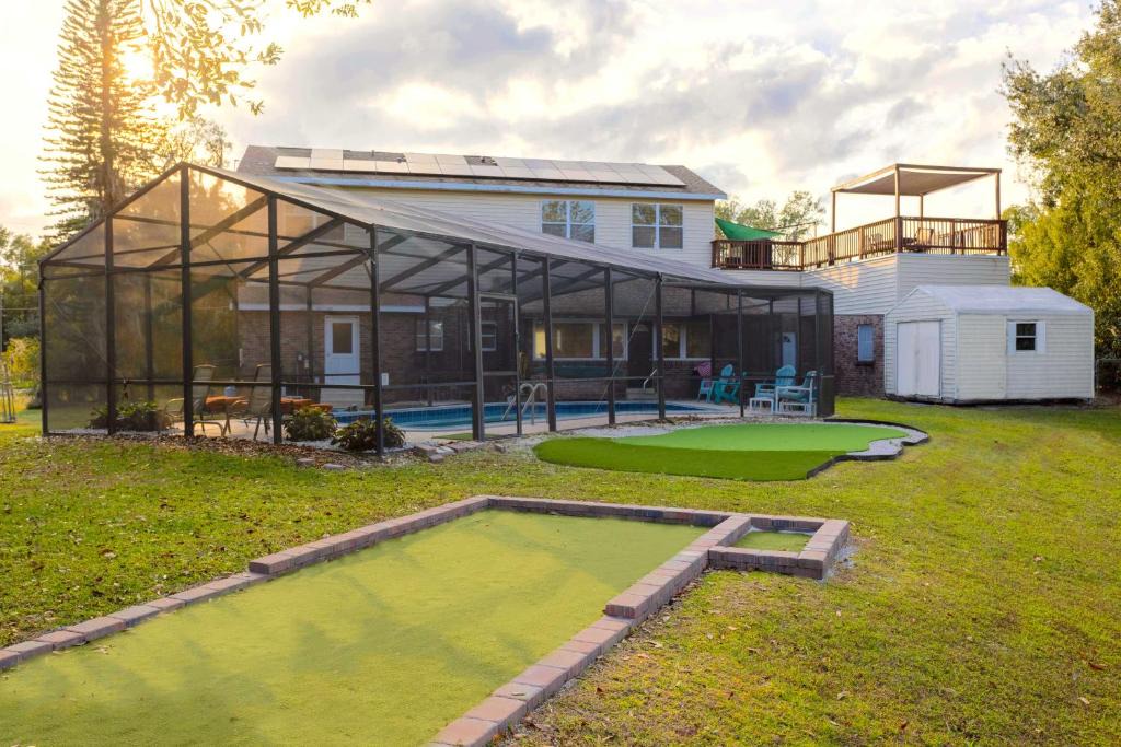 Edgewood House | Lakefront 7 Bedroom Duplex, Pool, Boat, and Hottub