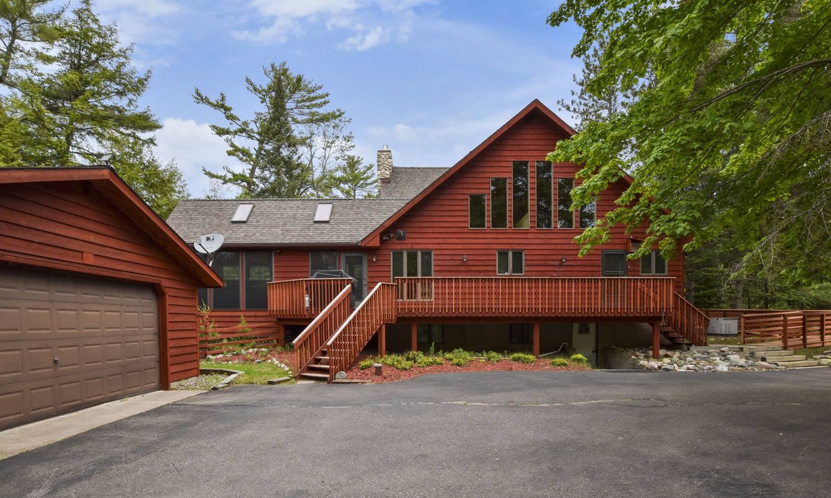St Germain House | Large home Big Sant Germain Lake sleeps 13 breathtaking views of the sunset.