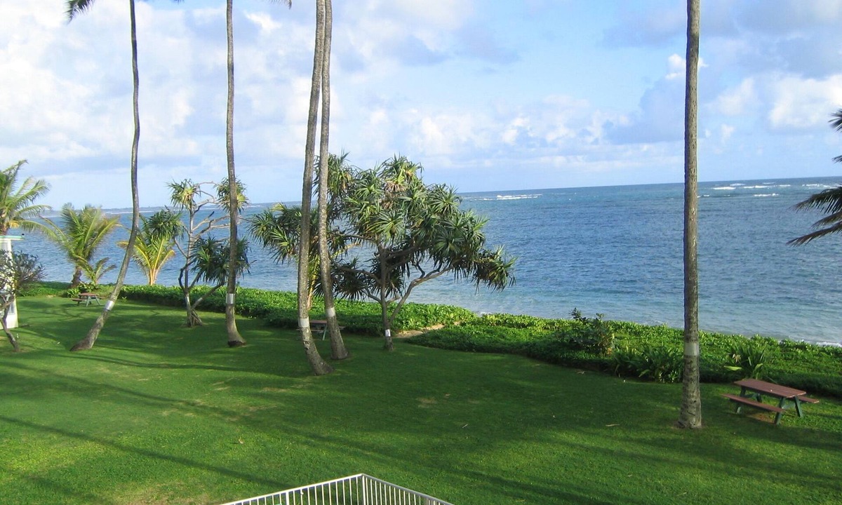 Punaluu Condo | Largest Private Patio on the Ocean and Air-Conditioning