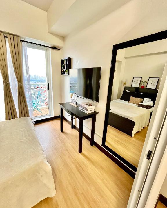 A. Bonifacio Apartment | Lark Staycation