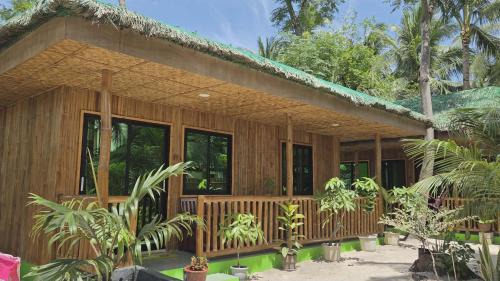 Santa Fe Resort | Lazy Coconuts Beach Hut