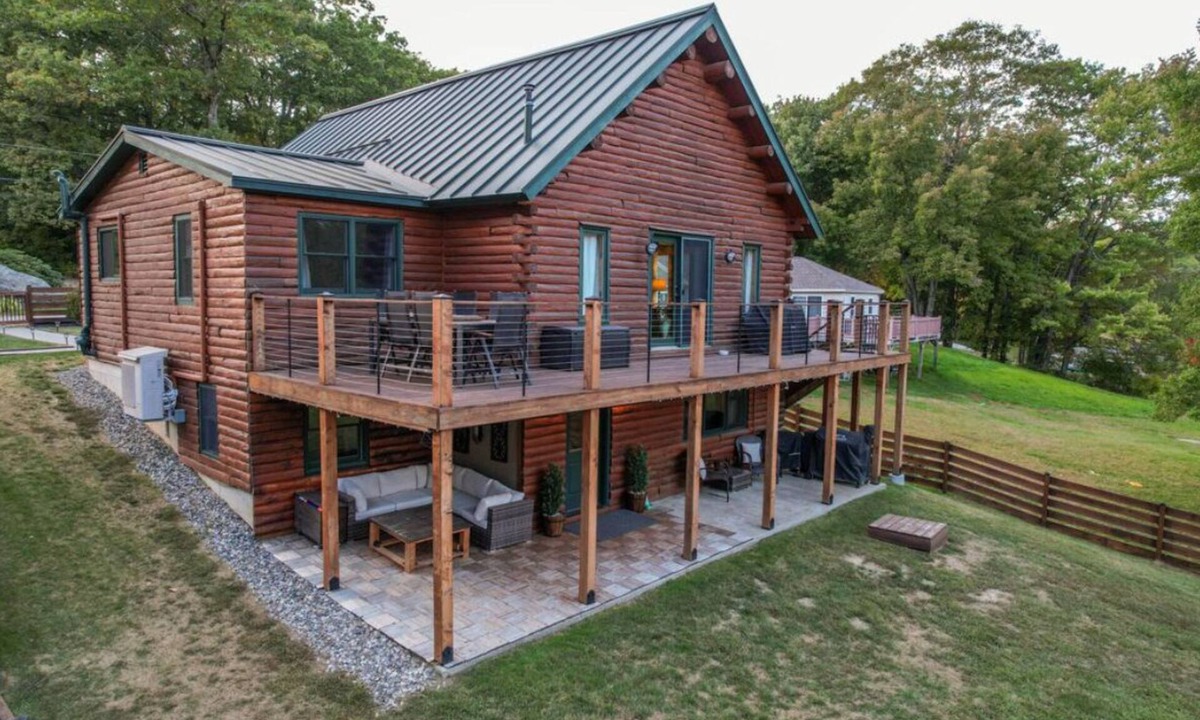 Augusta House | Luxurious Lakefront Log Home with Private Dock and fenced in yard