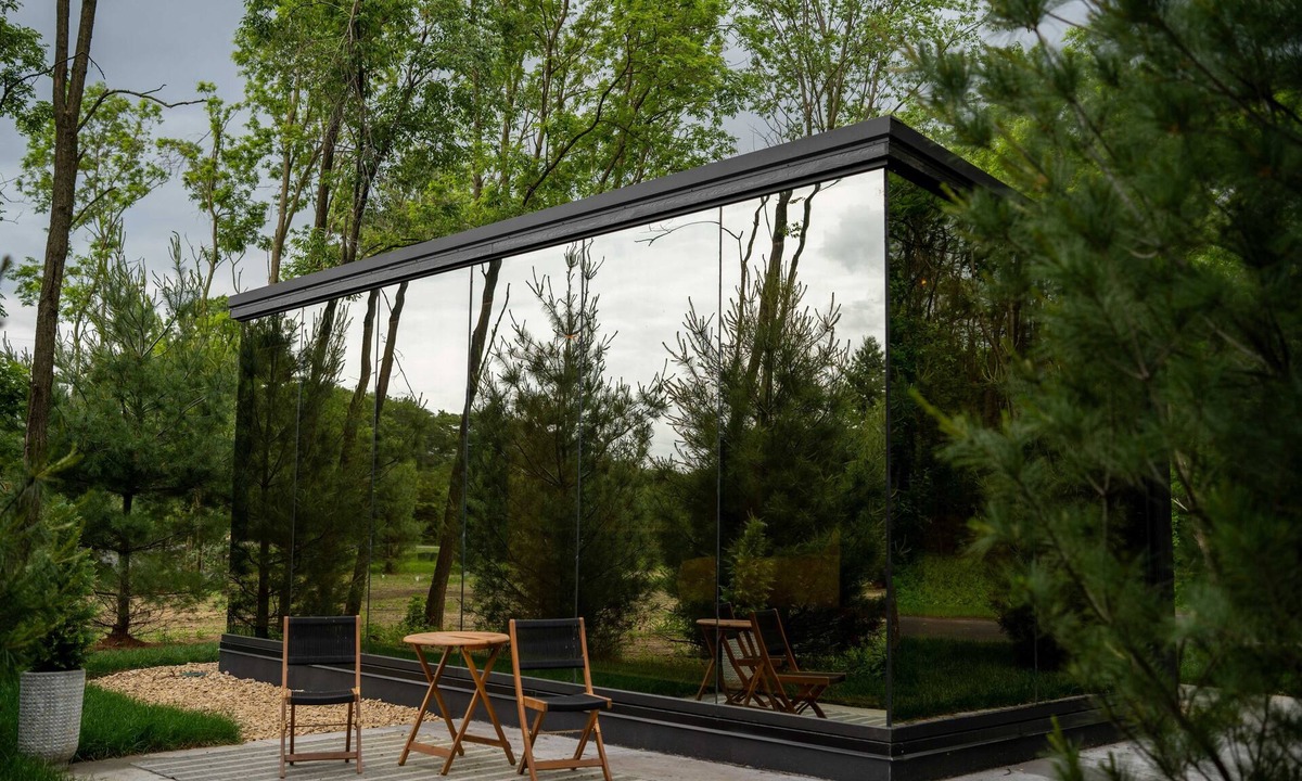 Pepin Cabin | Luxurious mirrored cabin nestled on the Woods & Co Weddings + Events property for the ultimate getaway