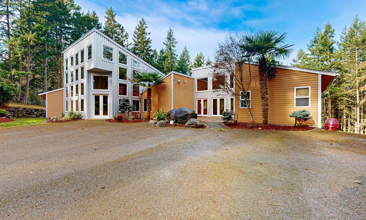 Sequim House | Luxurious tropical home with private hot tub atrium, theater & pond
