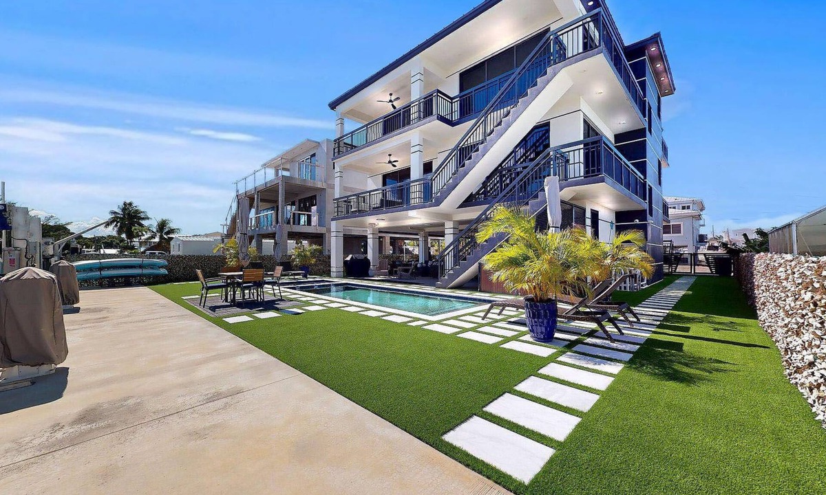 Sexton Cove Estates House | “Luxury Canal-Front Home w Pool, Dock & Ocean Access Key Largo”