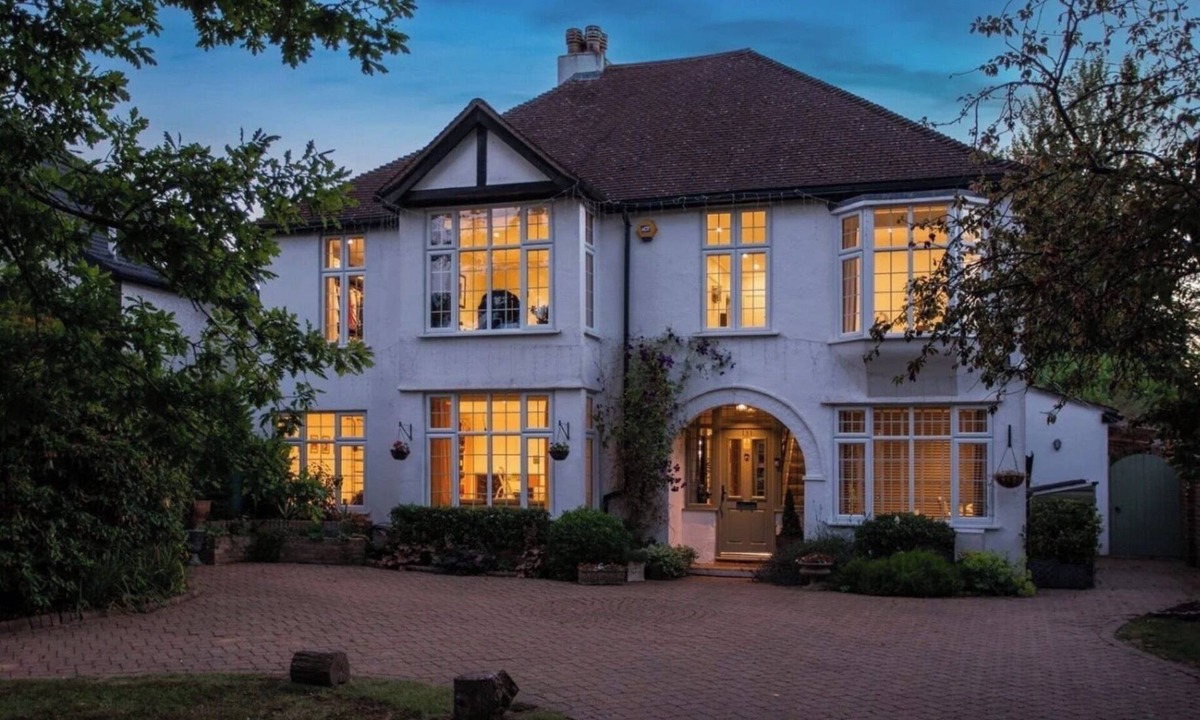 Caterham House | Luxury family home in Surrey, UK with garden, pool table, fireplace & playground